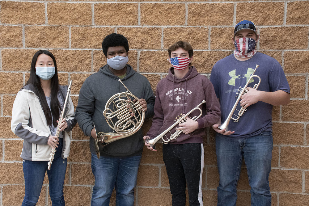 Students holding instruments